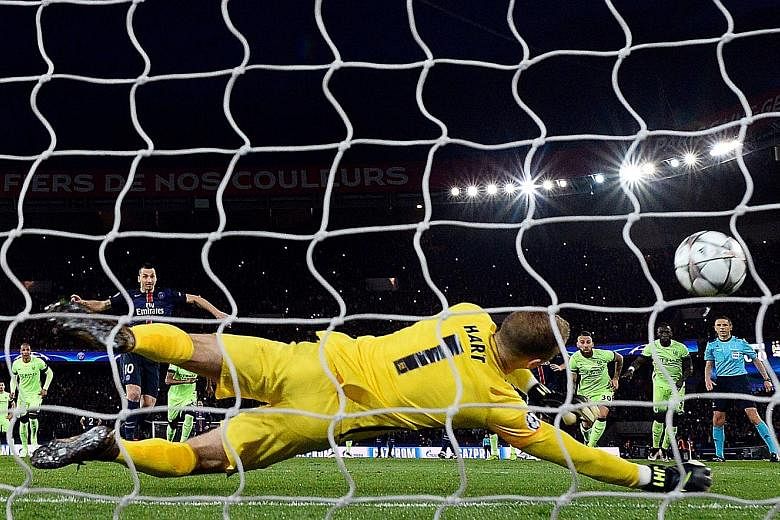 Joe Hart palming away a penalty taken by PSG's Zlatan Ibrahimovic. That 14th-minute save by the Man City 'keeper was big, as it kept the scoreline 0-0.