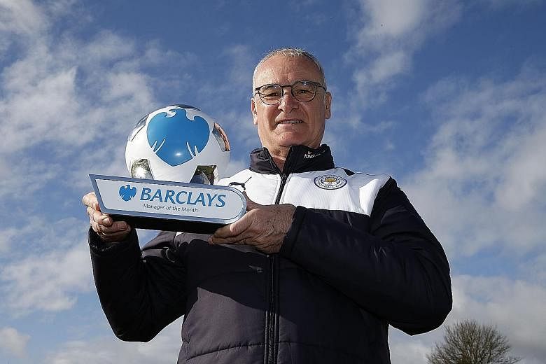 Leicester City manager Claudio Ranieri showing off the Premier League Manager of the month award for March which he received yesterday. His next task is to secure Champions League qualification and then ensure the Foxes win four of their six remainin