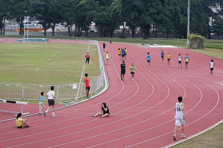 Recreational runners using the Kallang Practice Track. Sometimes they run on lanes the national athletes are using and disrupt the elite track-and-field performers' training.