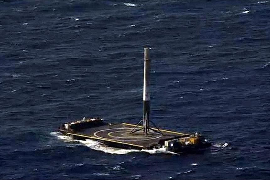 The rocket booster after landing upright on an ocean platform about 300km north-east of Cape Canaveral.