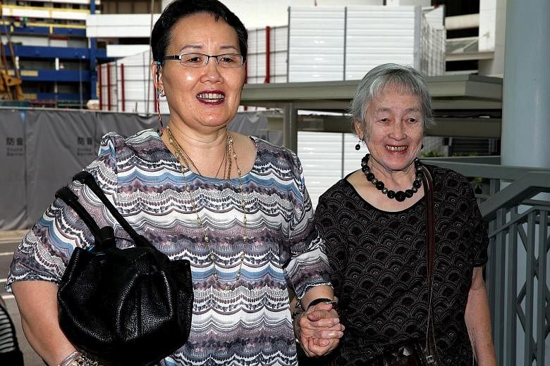 (From far left) Yang, Madam Mok and Madam Chung. Under the law, Madam Mok will not have to foot the legal fees for the case with Yang.