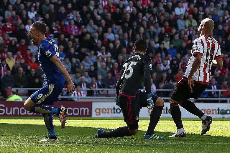 Leicester City's Jamie Vardy (far left) celebrating after scoring the opening goal during the league match against Sunderland at the Stadium of Light