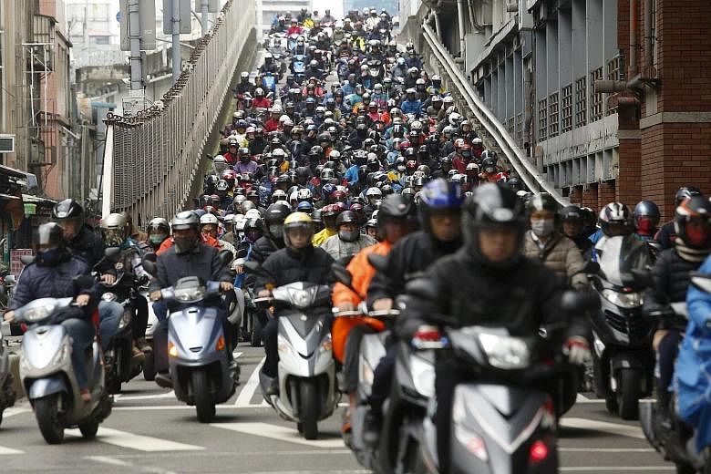 Morning rush hour in Taipei. Taiwan is rolling out a series of measures to recruit and retain foreign talent, both professionals and blue-collar workers.