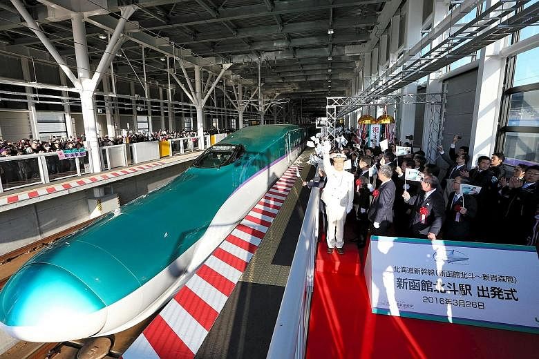 The first train on the new Shinkansen bullet train route linking Hokkaido and Tokyo leaving a station in Hokuto, Hokkaido, on March 26. Japan has long played a major role in the economic development of many South-east Asian nations.