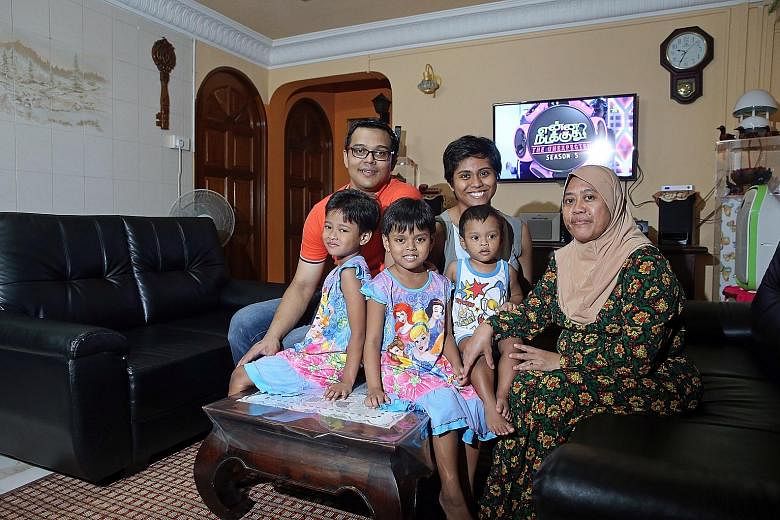 Mr Sathish and his fiancee Stella Shalini David John successfully applied for a Build-To-Order flat in Hougang last November, and received $60,000 in HDB grants. Madam Nur Liza and her husband Yulandi Abu Bakar with their children (from left) Nurul N