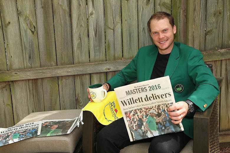 Danny Willett posing in his Green Jacket at his rented house in Augusta, Georgia, a day after winning the Masters on Sunday. He flew home to England to be with his wife Nicole and newborn son Zachariah instead of going on the usual champion's tour of