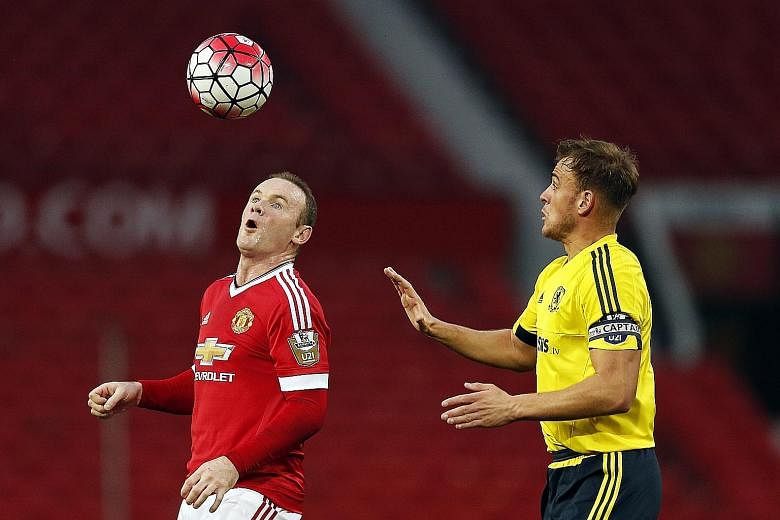Wayne Rooney controlling the ball during United's 1-0 win over Middlesbrough in their English Under-21 Premier League game. He looked a little rusty but came through without any problems and is desperate for play time to strengthen his claim for a st