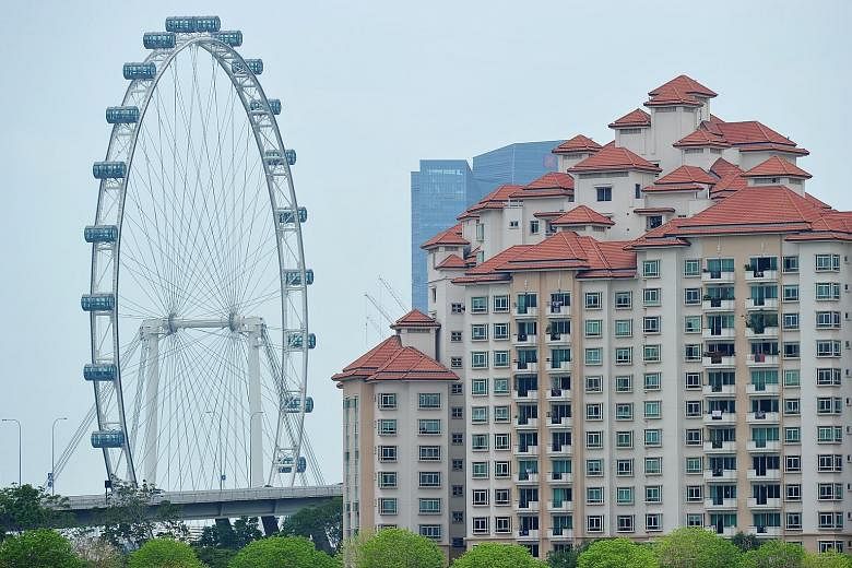 Costa Rhu Condominium in Tanjong Rhu, with the Singapore Flyer in the background. SRX data showed overall resale prices of non-landed private homes edged up by 0.3 per cent in March from February.