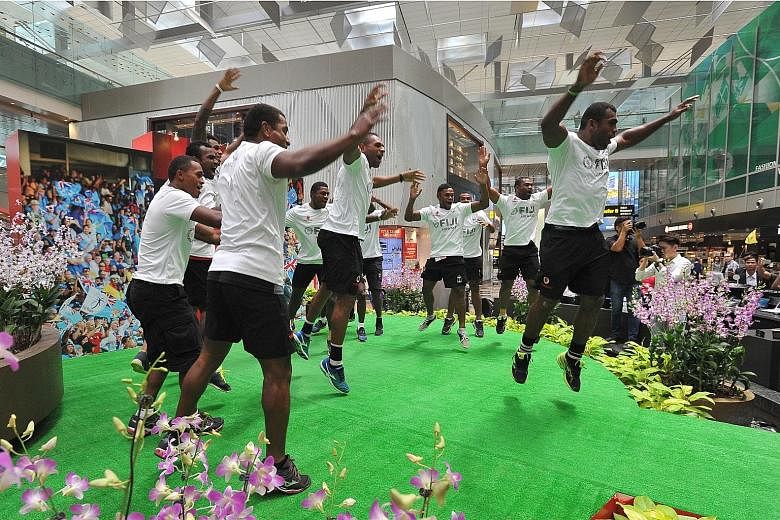 The Fiji Sevens team perform the Cibi, a traditional Fiji war dance, at Changi Airport. The Sevens World Series defending champions are hoping to triumph in the Singapore leg which is making its return to the sevens calendar after 10 years.
