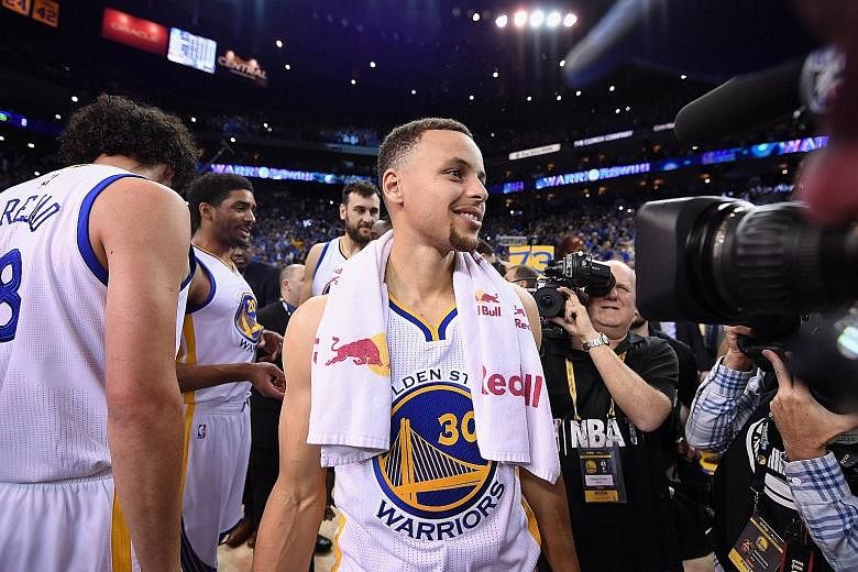 Having guided his team to a historic 73-9 record, Stephen Curry of the Golden State Warriors shows his relief after the 125-104 victory against the Memphis Grizzlies at Oracle Arena on Wednesday.