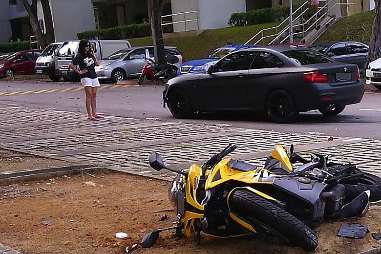 Actress Rui En (left) hit Mr Bahrom Sarmiten's motorcycle with her BMW on Tuesday. He rejected her offer of $2,000 compensation as he said it would not cover the cost of repairs to his bike.