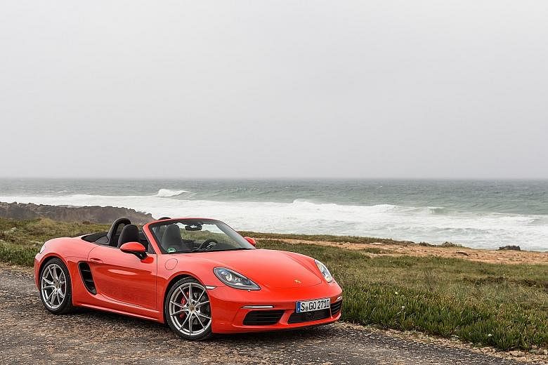 The revised Boxster, powered by a four-cylinder, sports new body panels and more pronounced creases. The 718 Boxster pays homage to the mid-engined 718 sports car which won Porsche many trophies in the 1950s and 1960s.