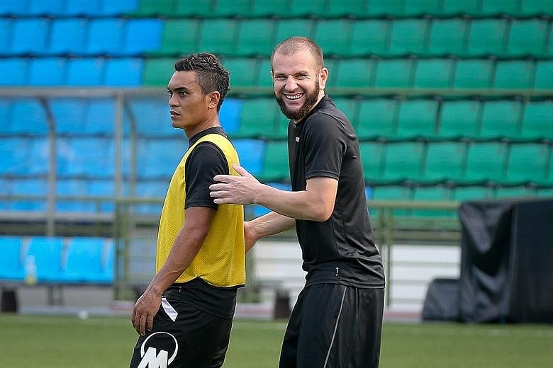 Tampines Rovers captain Fahrudin Mustafic (right) and Sufian Anuar at a training session at Jalan Besar Stadium yesterday. Mustafic, banished by Bernd Stange, is hoping to earn a national recall.
