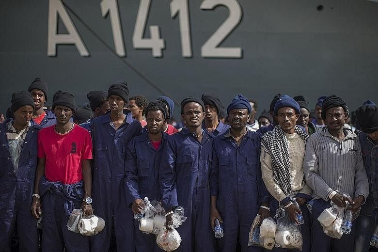 Migrants from Africa at the port of Augusta, Italy, after they were rescued at sea on Tuesday. Austria's leaders fear that as many as 300,000 migrants could arrive in Italy this year and attempt to move north.