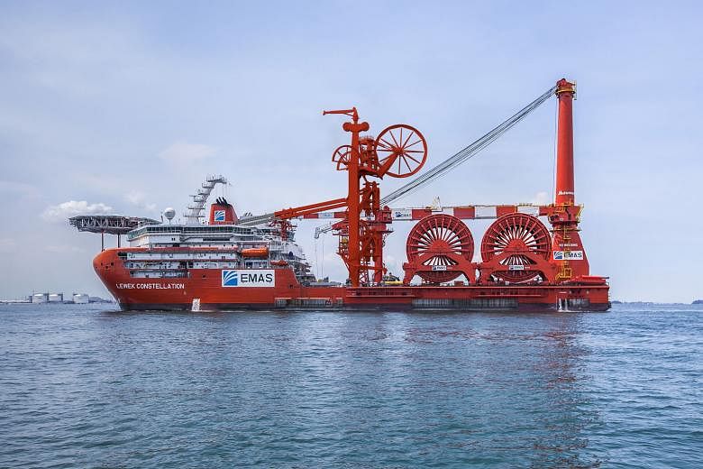 Emas AMC's $600 million flagship vessel Lewek Constellation. Chiyoda Corp's 50 per cent acquisition of Emas AMC has put Ezra in a better position to secure larger contracts with a strong partner, says Ezra's group CEO. 