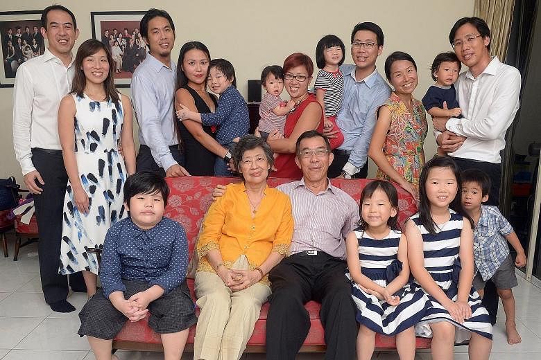 Mr David Choo (front row) with his wife Florence Tan and their grandchildren. (Back row from left) Eldest son Jonathan and wife Marianne; second son Wesley and wife Kareen; and twin sons Daniel and Graham (far right) with their respective wives Faith