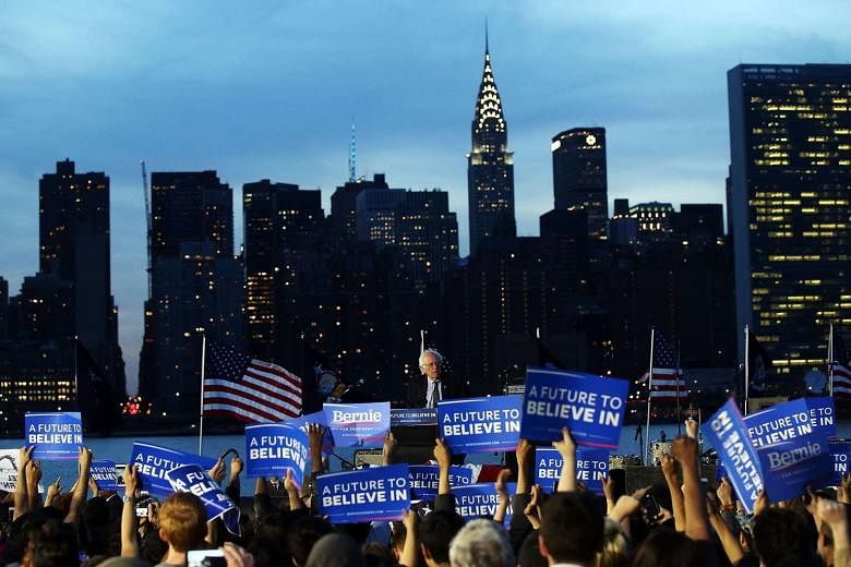 Democratic Presidential candidate Bernie Sanders speaks at a campaign rally on April 18 with the skyline of New York behind him.