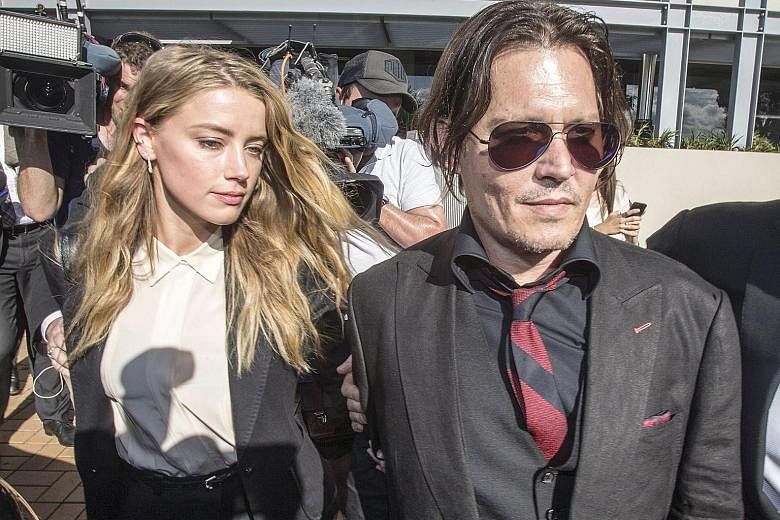 Johnny Depp and Amber Heard (both above) arriving at the Australian court. Heard pleaded guilty to falsifying travel documents to sneak two pet dogs into the country.