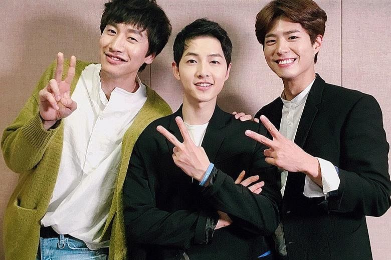K-drama heart-throb Song Joong Ki (centre) with his guests at the fan meeting, Lee Kwang Soo (left) and Park Bo Gum.