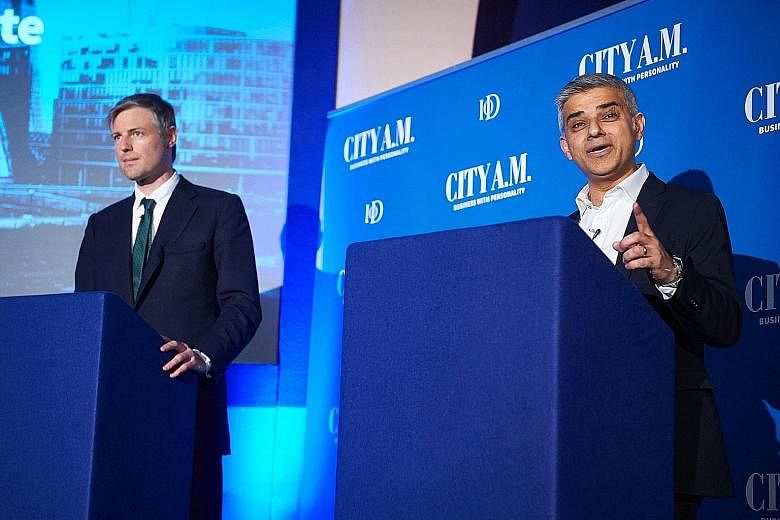 Conservative Party candidate Zac Goldsmith (left), who is from a prominent German-Jewish family, and Labour candidate Sadiq Khan, the son of Pakistani immigrants, at a mayoral debate in London last week. Mr Khan has said that electing a Muslim mayor 