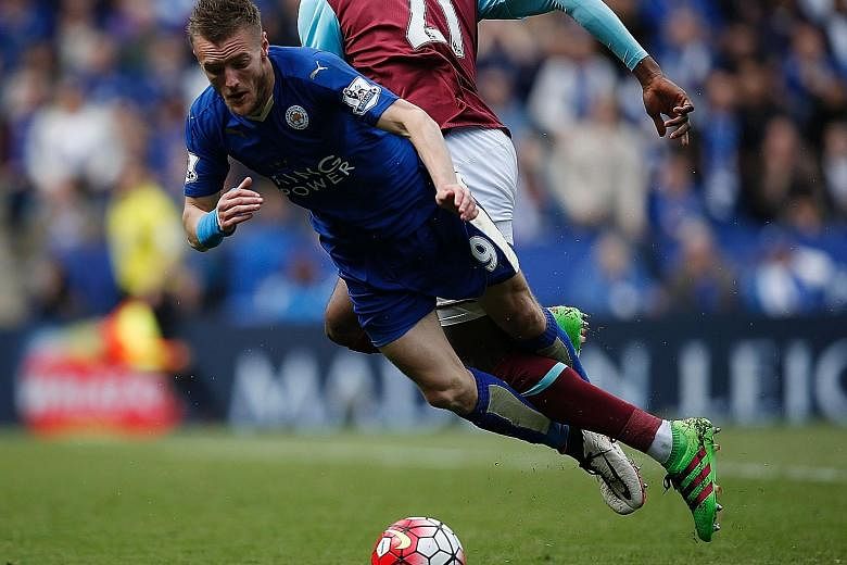 Leicester's Jamie Vardy going down in the box under pressure from West Ham's Angelo Ogbonna during their Premier League match at the King Power Stadium. Vardy was shown a second yellow card for simulation and will be suspended for Sunday's game again