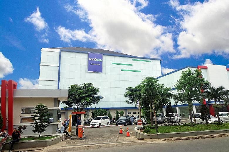 First Reit, which has properties in Indonesia, including Siloam Hospitals Purwakarta in West Java (above), says plans to lift ban on foreign ownership of healthcare businesses will spur expansion.