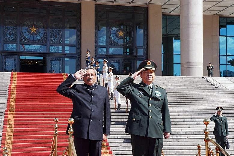 Mr Parrikar (left) with his Chinese counterpart, Mr Chang Wanquan.