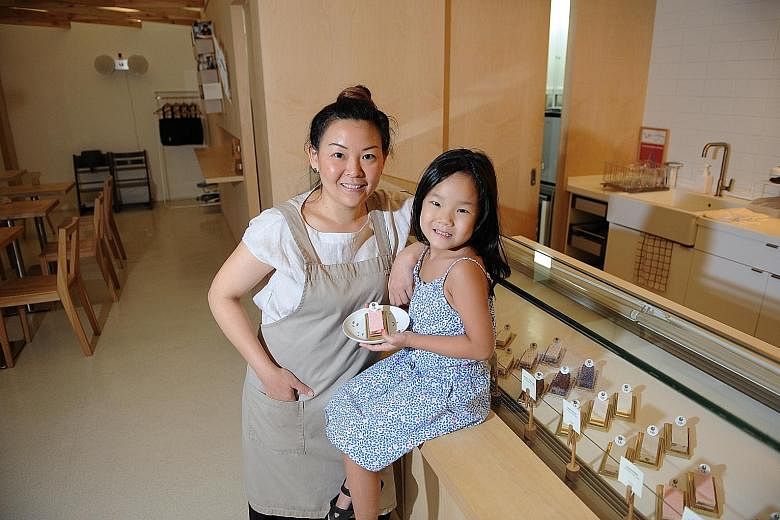 Kki Sweets's Ms Liau and her daughter Shannon at the outlet in the School of the Arts. Ms Liau and her husband were inspired to set up shop after their honeymoon in Japan.