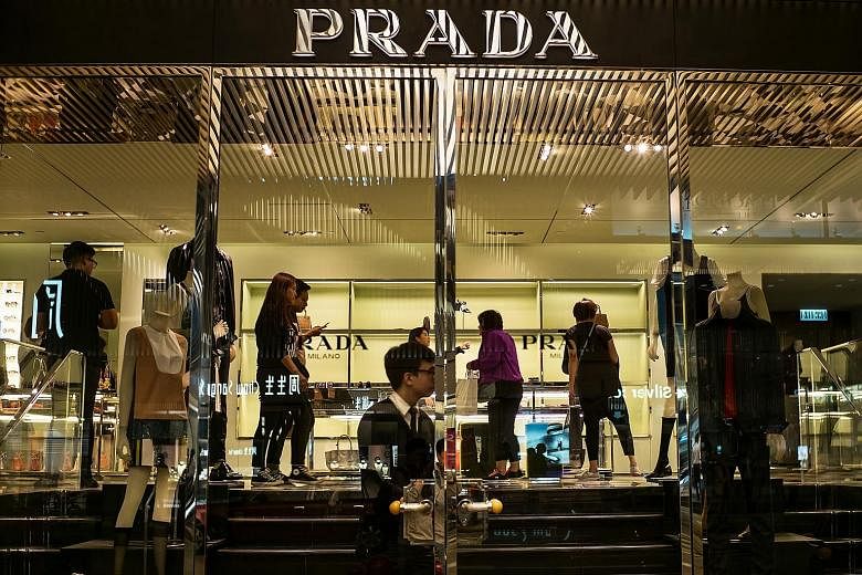 The Italian luxury goods-maker, which opened too many stores in Asia, plans to curb expansion and offer a larger range of goods online.