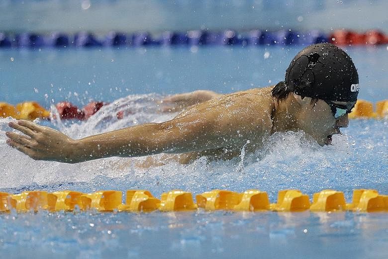 Dylan Koo on his way to clocking a meet record of 54.30sec in the boys' A Division 100m butterfly. He and three other ACS(I) swimmers - Francis Fong, Mikkel Lee and Darren Chua - each won four golds.
