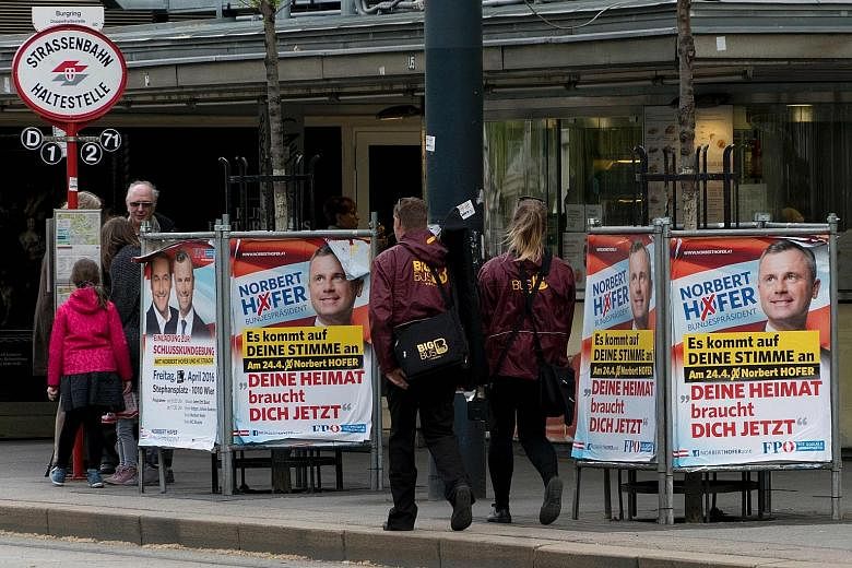 Election campaign posters of Austrian presidential candidate Norbert Hofer of the Freedom Party in Vienna on Tuesday. He is among three wild cards in the ballot tomorrow.