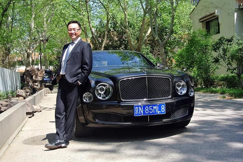 Bentley China's managing director Daniel Khoo (pictured with the flagship Bentley Mulsanne) has spent 17 years working overseas for some of the biggest names in the car industry, from Saab to Audi and Bentley. His rise up the ranks came largely as a 