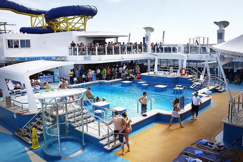 (Top) One of many public pool areas aboard the Norwegian Escape and (above) a private pool in the Haven, a separate accommodation area for wealthy guests aboard the cruise ship.