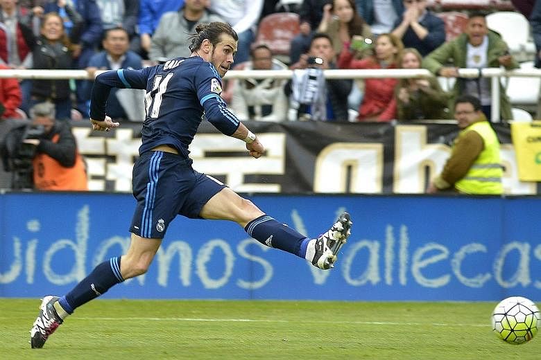 Gareth Bale scoring Real Madrid's third goal against Rayo Vallecano on April 23. The Welshman masterminded the fightback from 0-2 down.