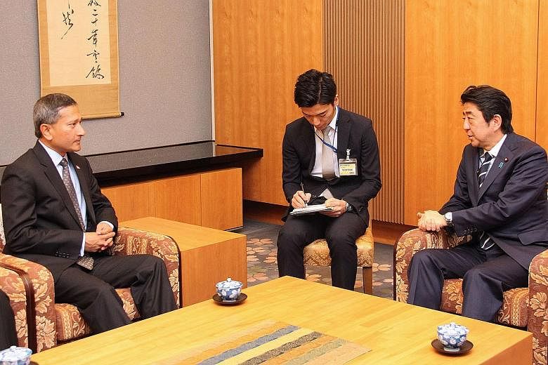 Dr Balakrishnan (left) calling on Mr Abe in Tokyo yesterday. The two leaders discussed the important role that Japan plays in keeping the peace and stability in Asia.
