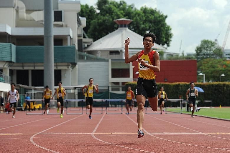 Hwa Chong Institution's Ow Yeong Wei Bin took gold in In the A Div 400m hurdles, beating the previous meet record set by his brother.