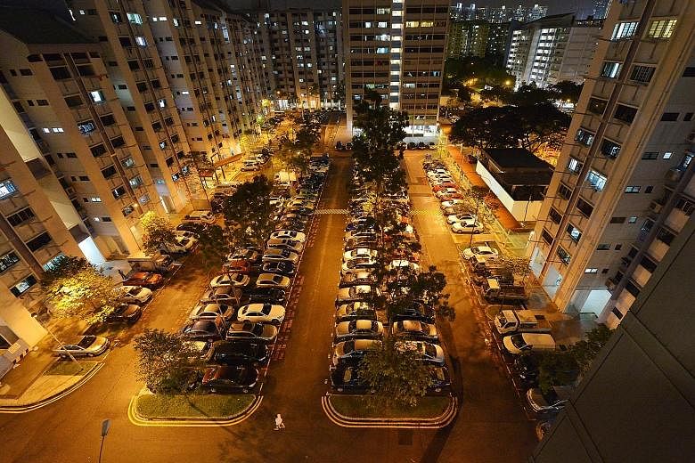 An HDB carpark at night. The Government is obliged to provide roads, because these are vital for business. But it is under no obligation to provide private parking space for cars below market rates, which it is doing now in HDB estates, schools and f