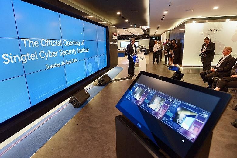 Dr Yaacob speaking at the opening of Singtel's Cyber Security Institute yesterday. Singapore must keep up its vigilance in cyber security in view of its Smart Nation initiative, he said, but it is not enough to train the troops - those in command mus