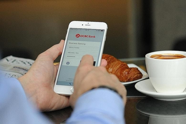 OCBC's new app taps Apple's Touch ID technology to enable fingerprint recognition.