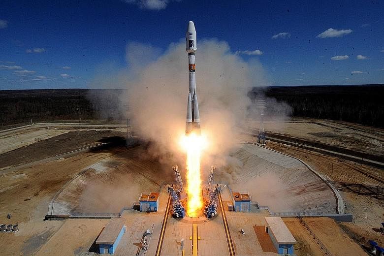 A Russian Soyuz 2.1a rocket carrying three satellites lifting off yesterday morning from the new cosmodrome outside Uglegorsk city in the far eastern Amur region.
