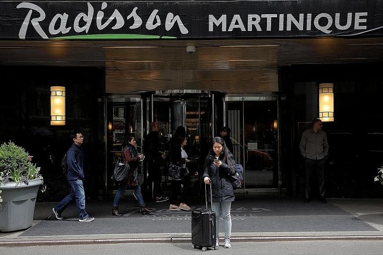 The Radisson Martinique hotel in Manhattan in New York, US. HNA Group's deal with the US-based Carlson Hotels, the owner of the Radisson hotel chain, will nearly quadruple the number of its hotels around the world.