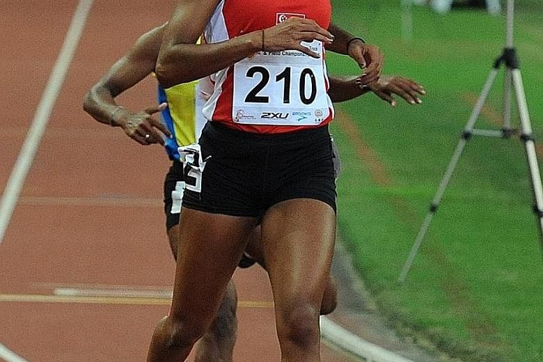 Shanti Pereira running in the women's 200m final in the 78th Singapore Open at the National Stadium yesterday. She clinched her first gold of the meet with a time of 24.04sec.