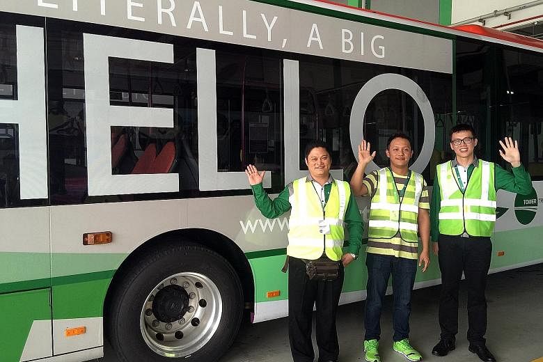 Among Tower Transit's new bus drivers are (from left) Mr Kong Chiong Ping, 42; Mr Lee Zi Yang, 35; and Mr Lee Shao Xiang, 29. Singapore's newest public bus company offers a higher starting wage than SMRT and SBS Transit, and 26 weeks' paid maternity 