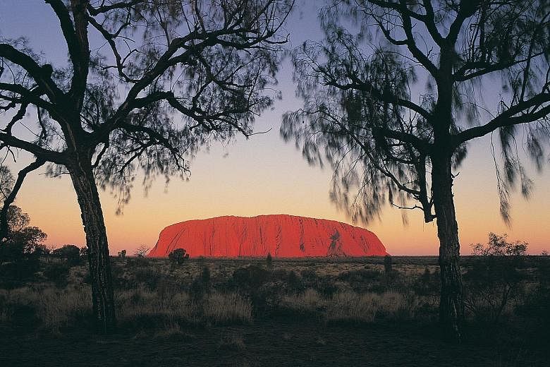Ayers Rock or Uluru, a 700-million-year-old monolith, is one of Australia's best known tourist landmarks. The steep climb to the top is at the centre of a long-running dispute. 
