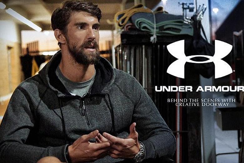 (Left) Swimmer Michael Phelps in an Under Armour advertisement. (Above) The launch ceremony of the Uncle Martian brand last week. Under Armour has said that it will take action against Uncle Martian's use of its logo and intellectual property.