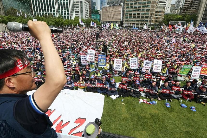South Koreans protesting against labour reforms pushed by the government at a rally in front of City Hall in Seoul yesterday.