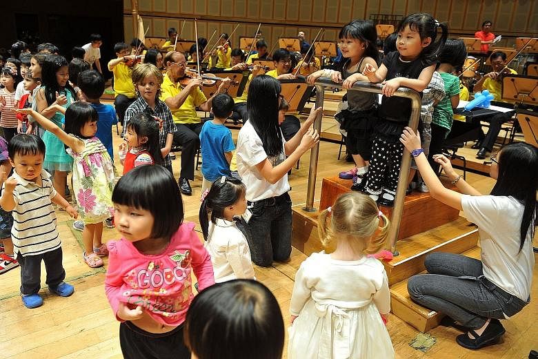 Children attending the Babies' Prom get to share the stage with the musicians towards the end of the concert.