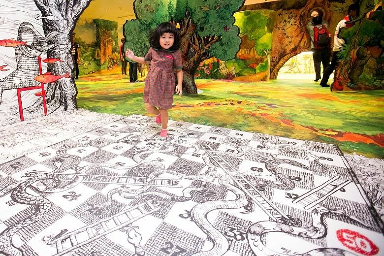 Children step into the pages of a giant storybook at the Keppel Centre for Art Education.