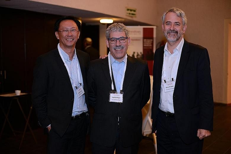 Attending a Trendlines event in Israel earlier this year were (from left) Mr Gerald Goh, chief executive of PrimePartners Corporate Finance, and Mr Dollinger and Mr Rhodes, Trendlines' co-founders.