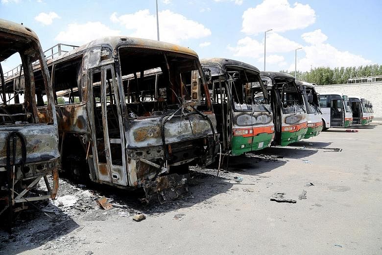 Buses belonging to the Saudi Binladin Group were reportedly torched by workers in a protest over unpaid wages in Mecca at the weekend.